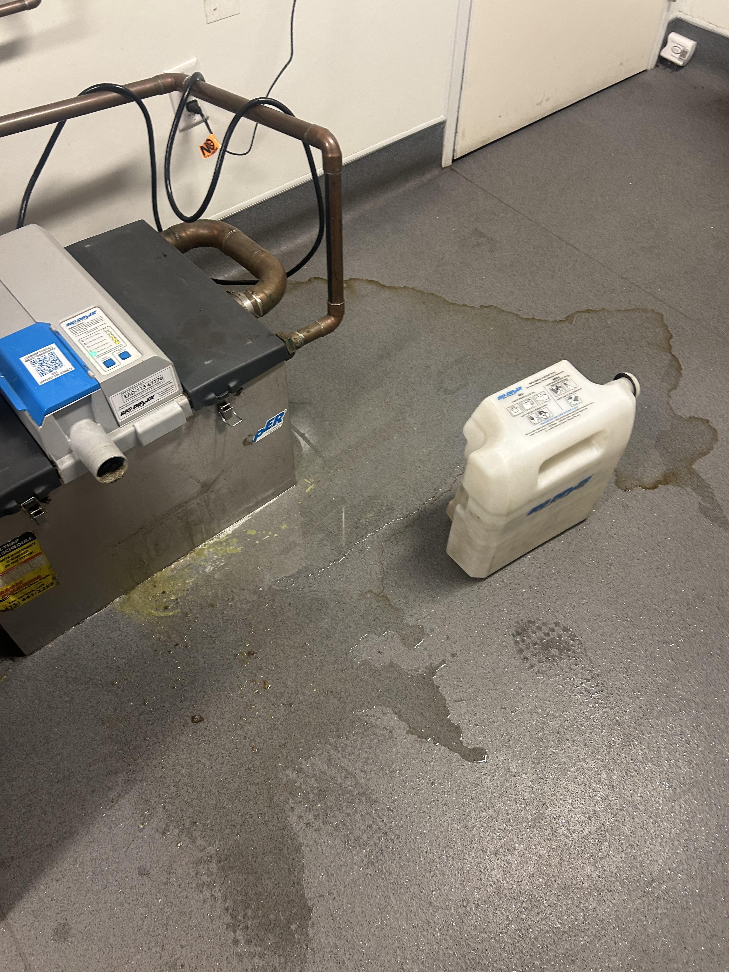 Back-of-house floor before cleaning