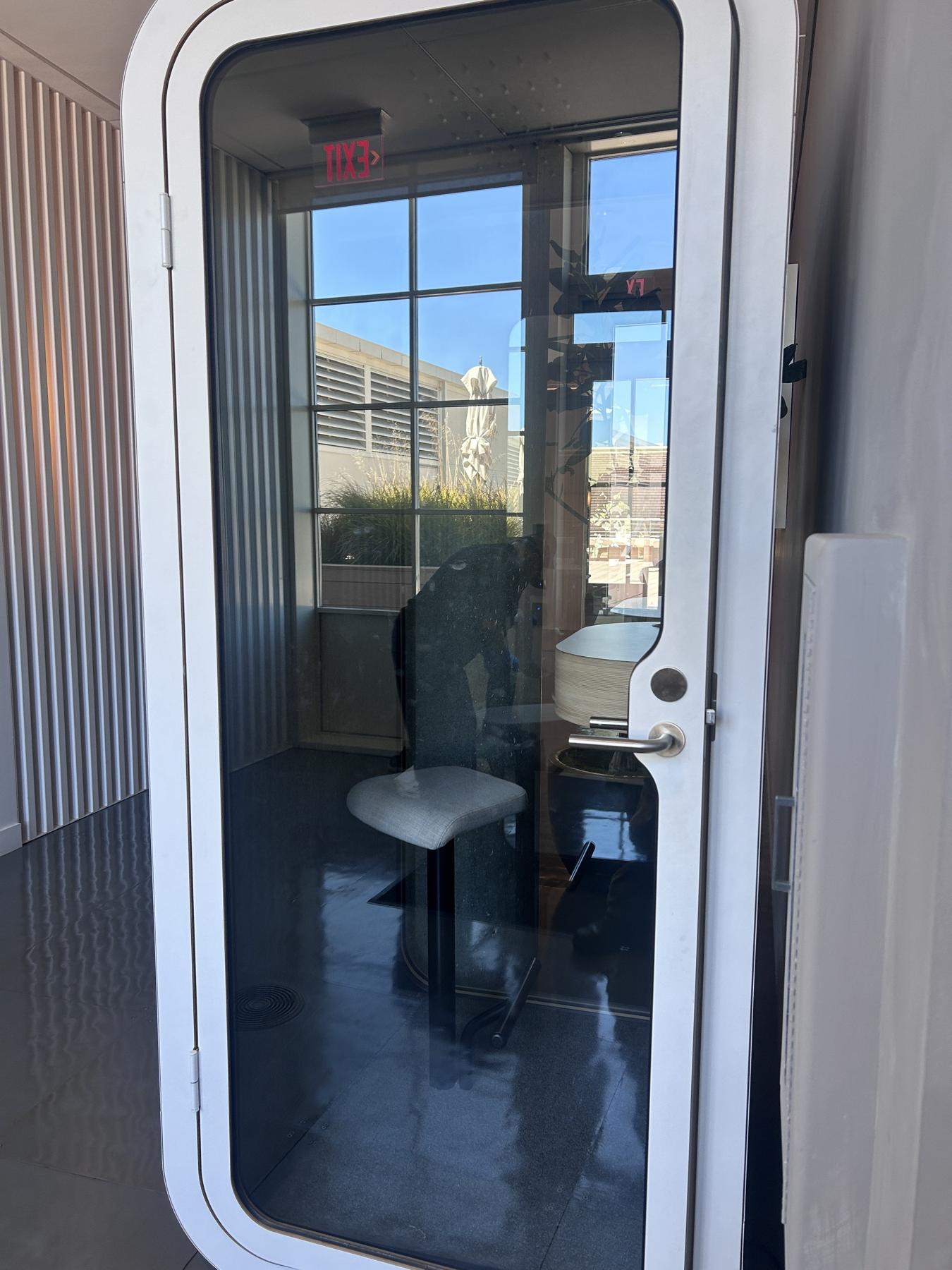 Glass office booth before cleaning